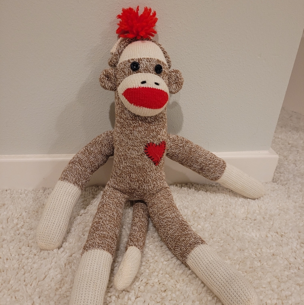 Sock Monkey with button eyes and heart patch ❤️